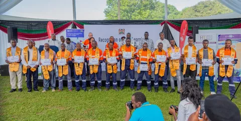 Image of a line of people receiving RPL certificates